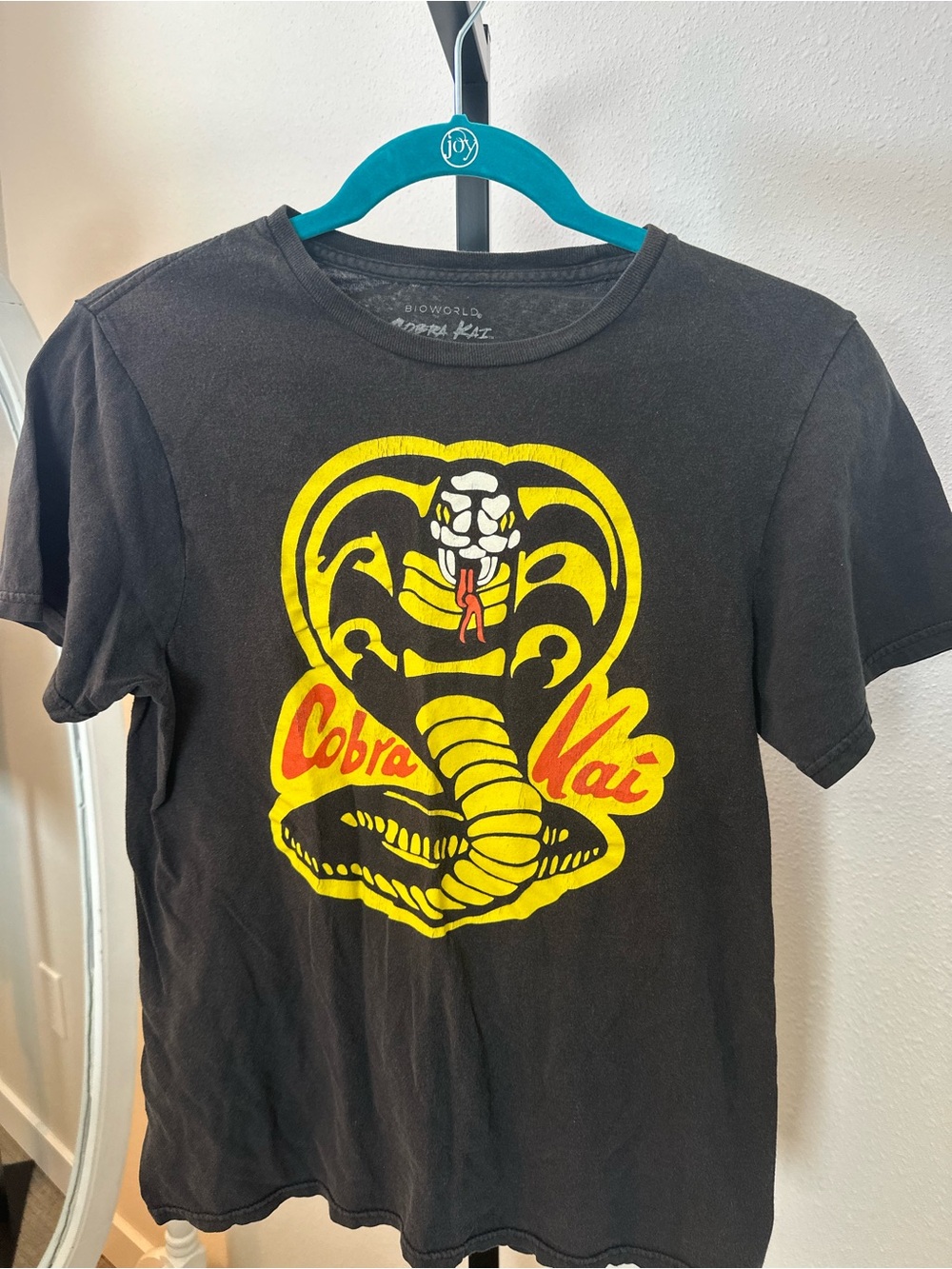 Bioworld Black Tee with Yellow and Red Cobra Graphic